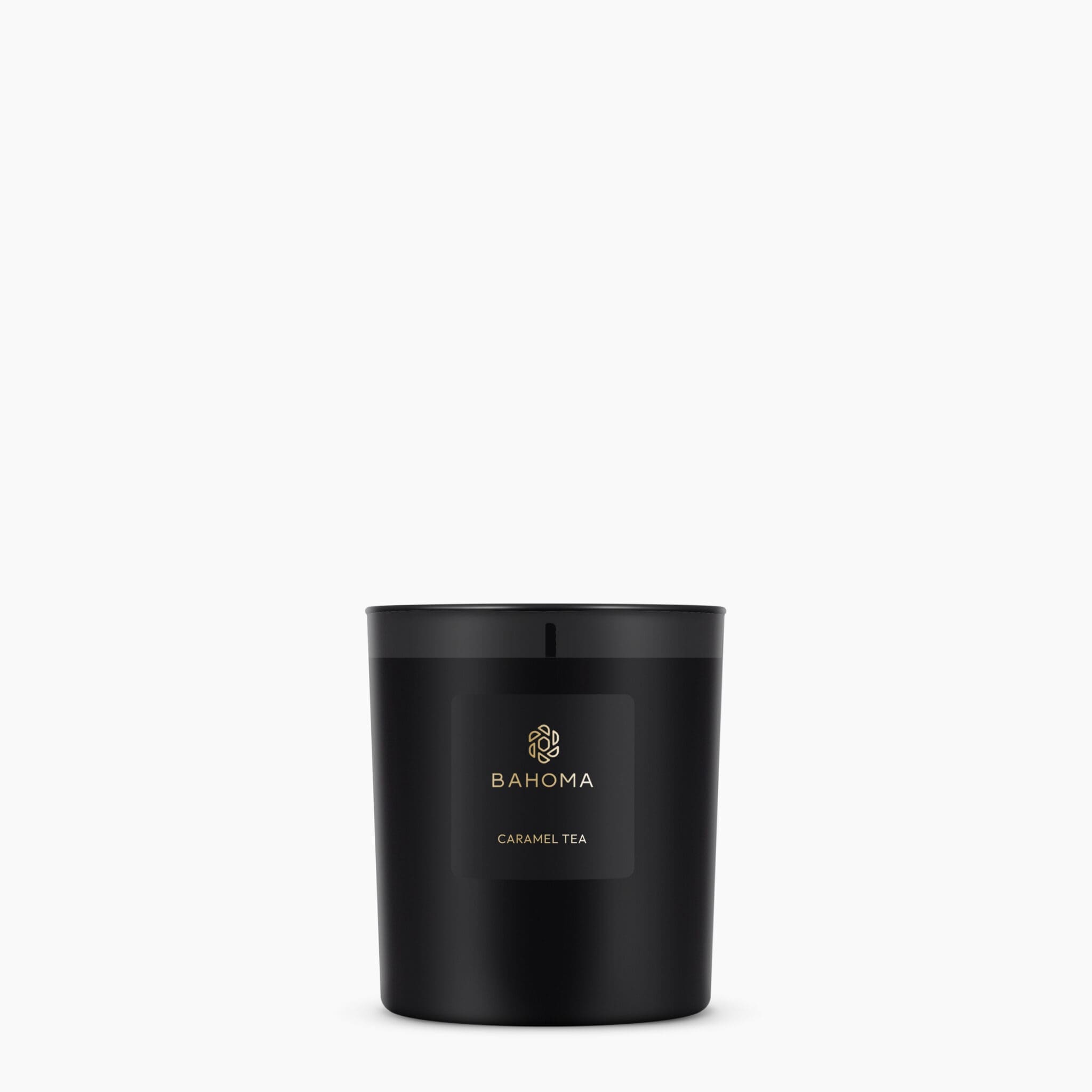 obsidian-collection-scented-candle-black-vessel-black-wax-black-label-gold-branding-caramel-tea