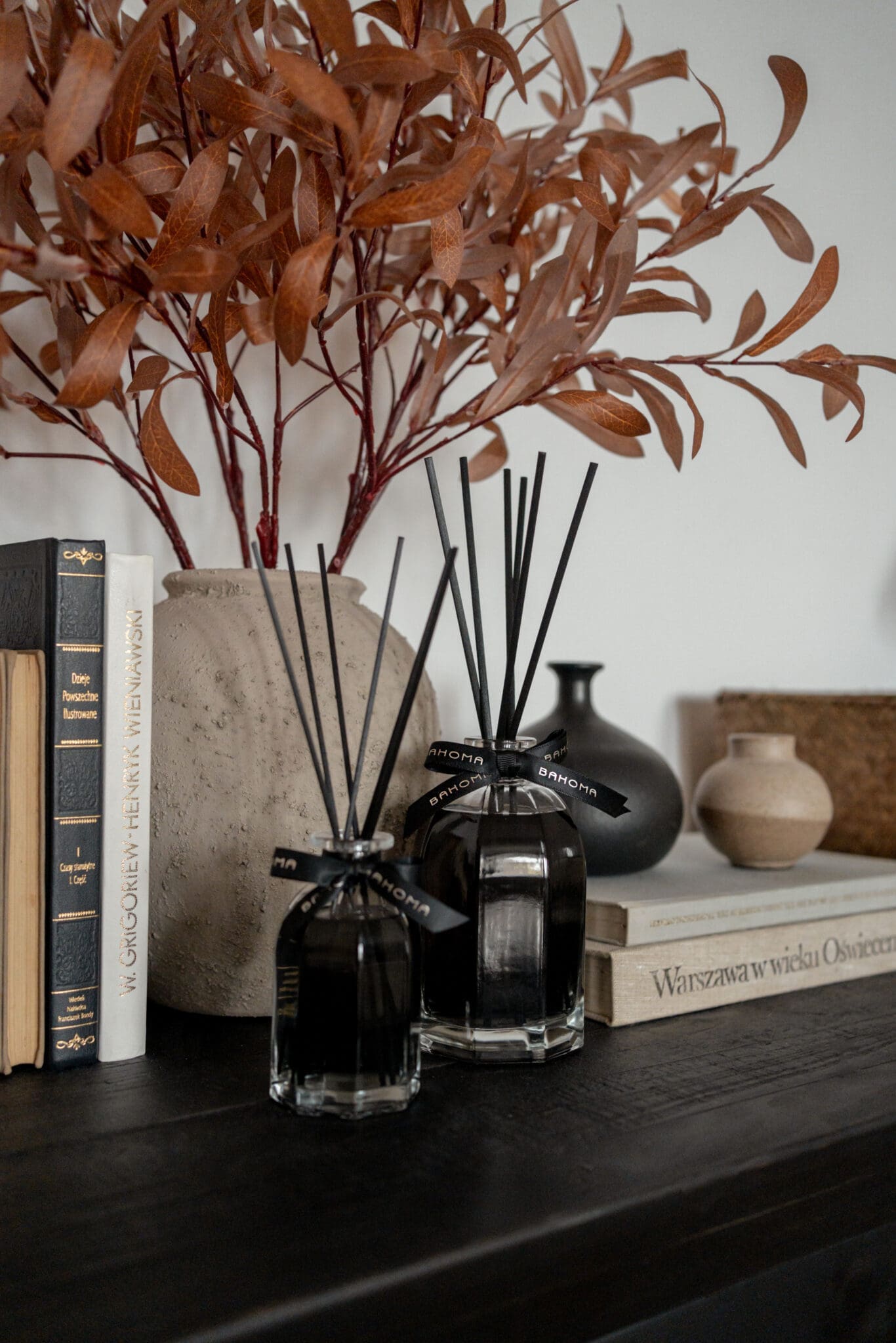 100ml-Octagonal-Diffuser-in-a-gift-box-black-liquid-on-a-wooden-surface