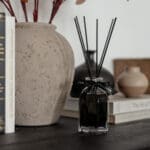 200ml-luxury-reed-fragranced-diffuser-obsidian-black-liquid-black-reeds-on-a-side-table