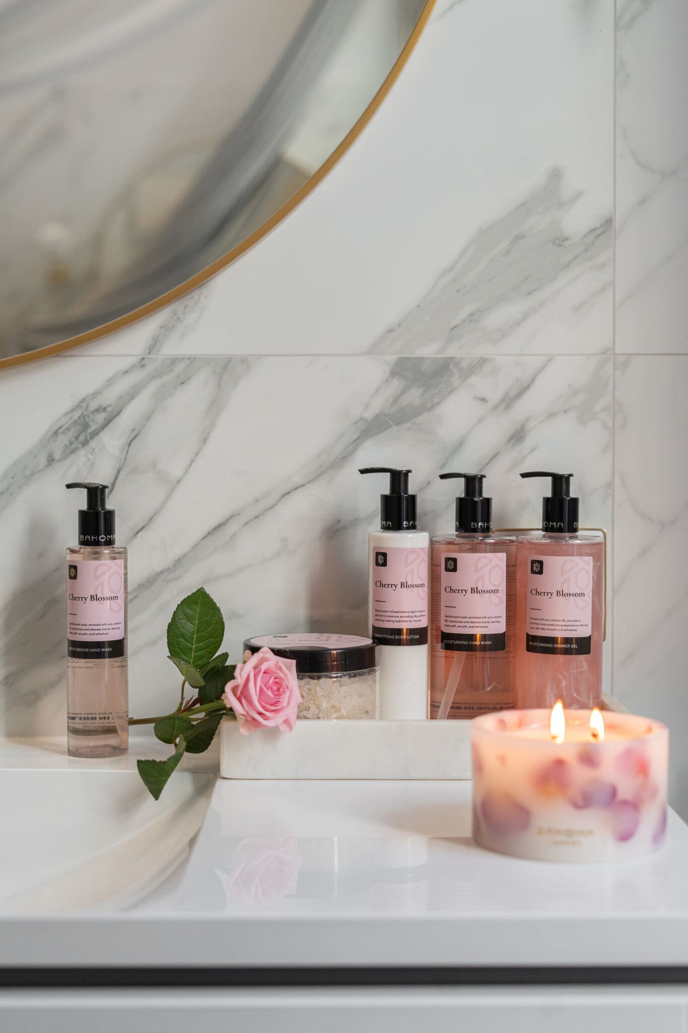 500ml-moisturising-shower-gel-cherry-bossom-with-hand-wash-hand-moisturiser-bath-salts-and-candle-in-bathroom