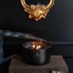 Fragranced-3-Wick-Candle-Obsidian-collection-black-vessel-black-wax-lit-up-striking-image