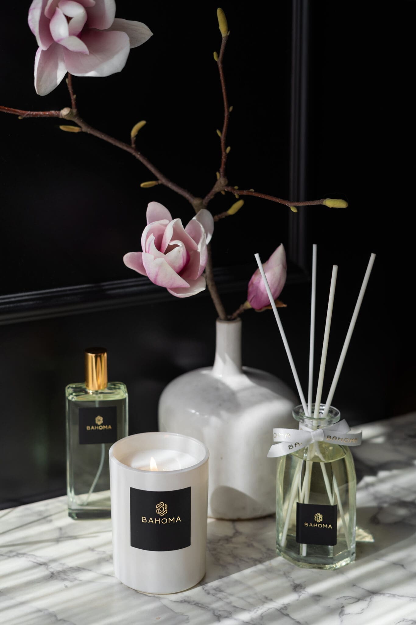 luxury-scented-candle-pearl-collection-white-vessel-white-wax-on-marble-top