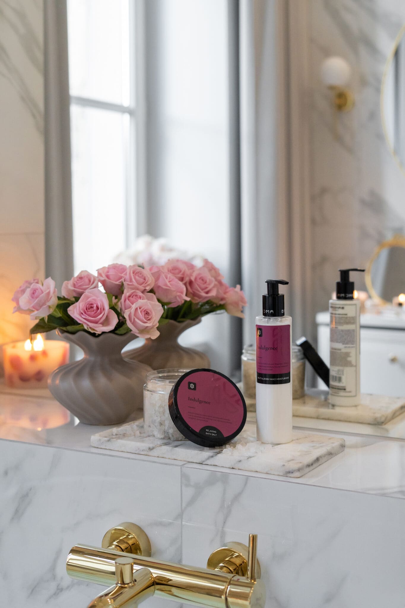 mineral-bath-salts-relaxing-soak-indulgence-with-smoothing-body-lotion-in-a-bathroom-by-mirror