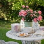 garden-rose-grand-pillar-candle-outdoor-nature-on-table-with-tea