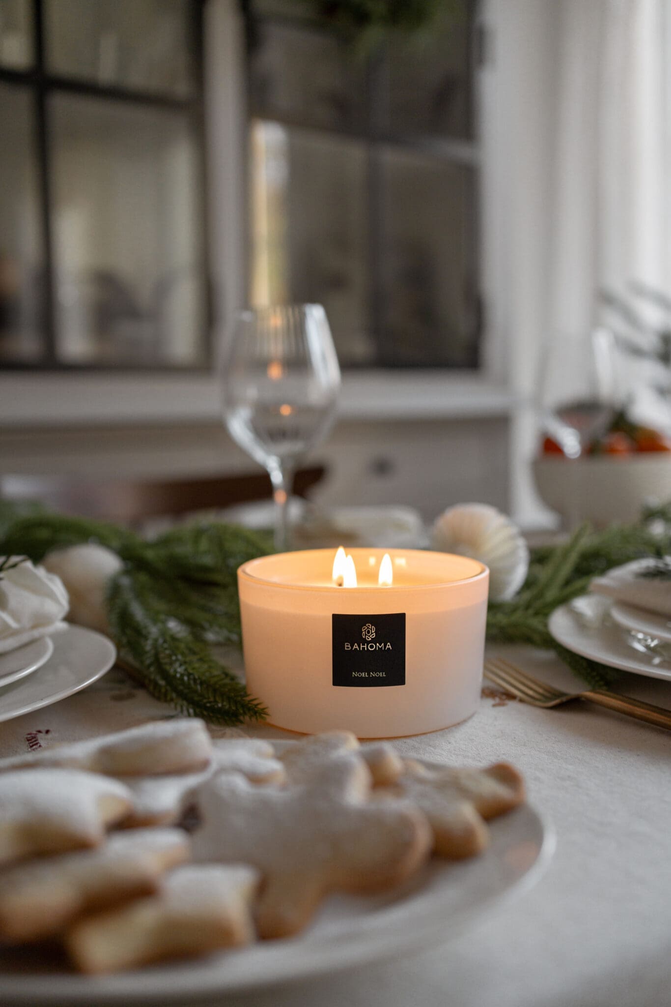 Noel Noel White 3 wick candle in table setting