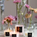 Wild Heather & Oakwood - Set of 3 Compact Candles in Gift box. Image showing a selection of compact candles in lifestyle setting.