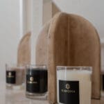 Bahoma Set 3 x Travel Candle in a box lifestyle display; luxury scented candle gift set for home decor and travel.