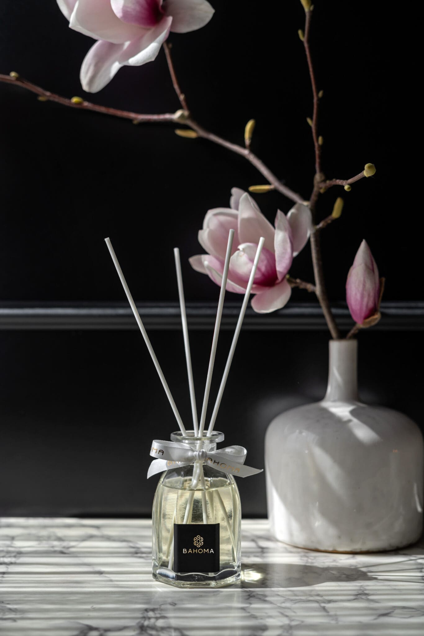 Set-2-x-100ml-Octagonal-Diffuser-in-a-gift-box-with-a-vase-on-marble-top