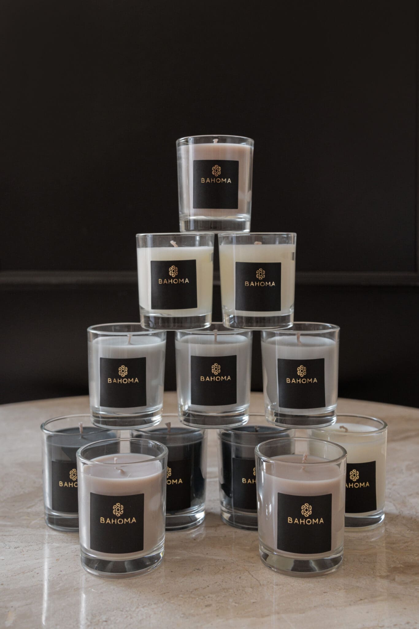 Set 3 x Scented Travel Candle in a box in a lifestyle arrangement of other fragrances and colours available in this product category